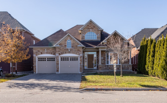 A beautiful home with two garages, garage door insulation, Smart garage doors, Choosing a garage door